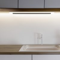 Cool White LED Strip Under Kitchen Cabinet Illuminating Sink Area