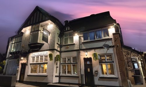 Oldfield Pub outdoor sign lighting and floodlighting in a warm white hue